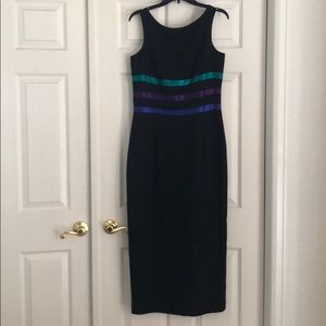 Black dress with green, purple, blue  accents .